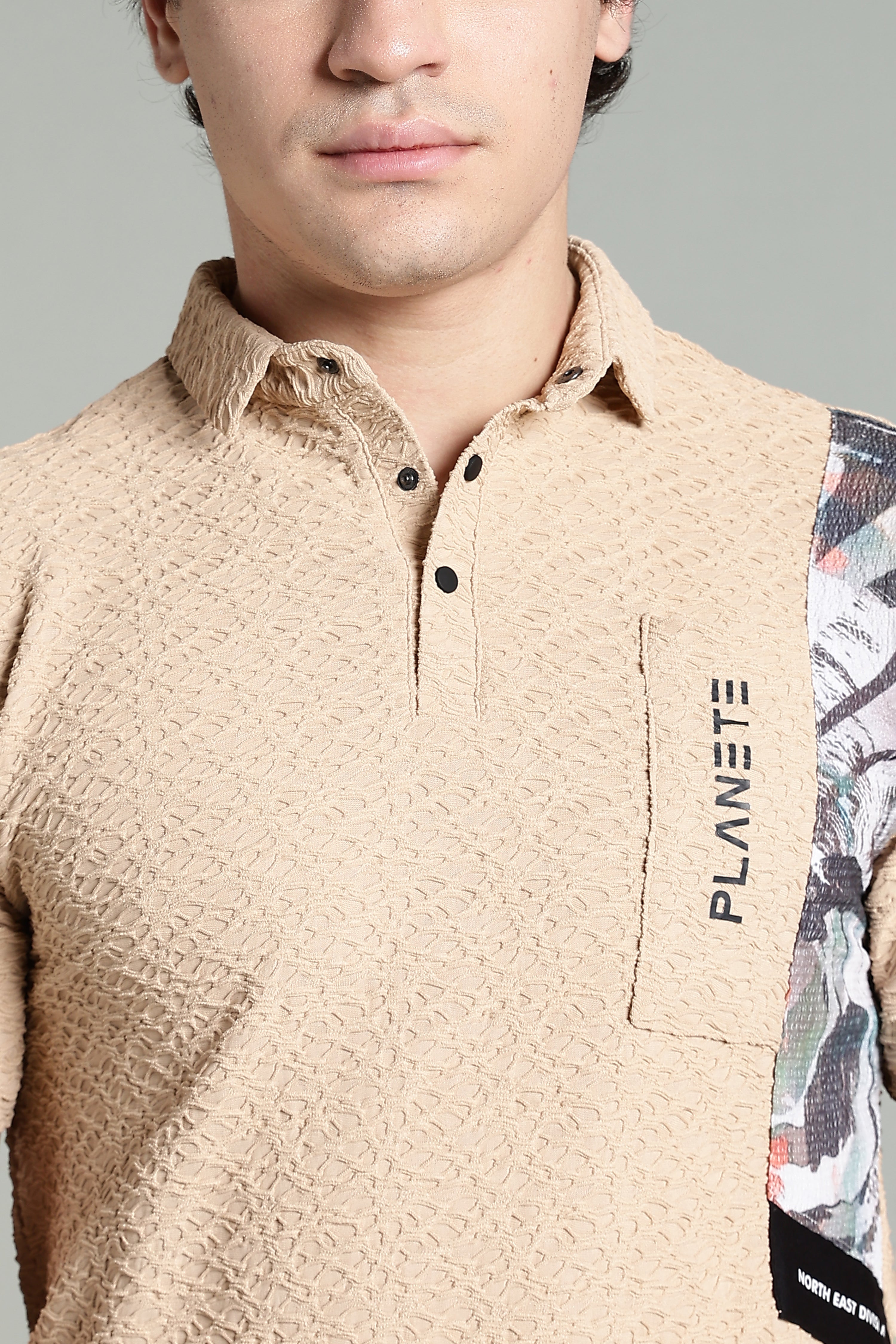 Textured Beige Polo Shirt with Graphic Panel